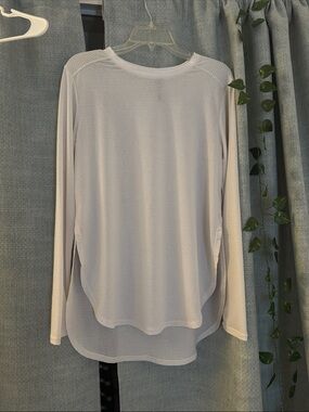 3/$25 Bundle and Save! Lightweight long-sleeve top from Mono B